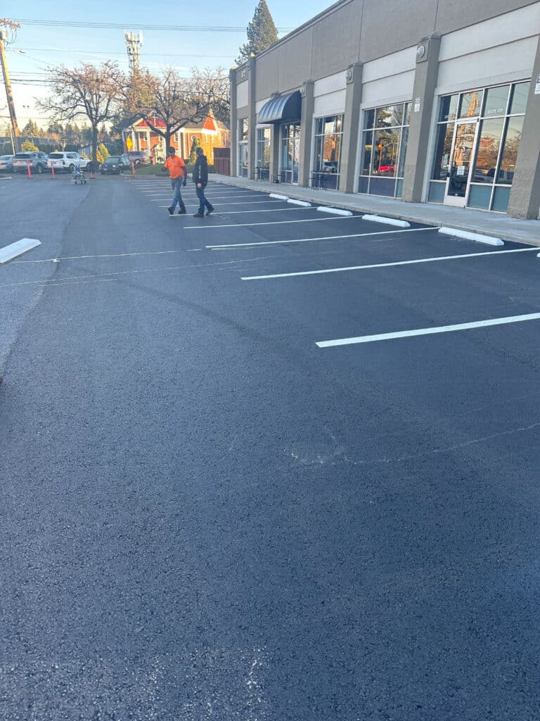 Finishing asphalt paved parking lot